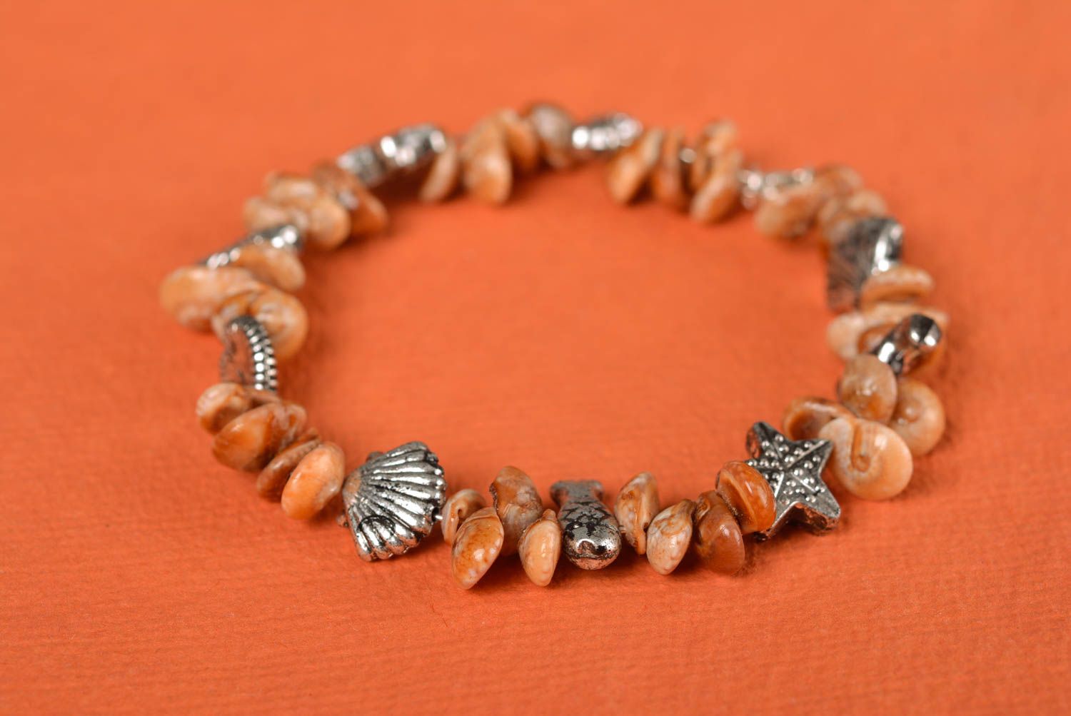 Handmade thin laconic wrist bracelet with seashells and metal charms for women photo 2