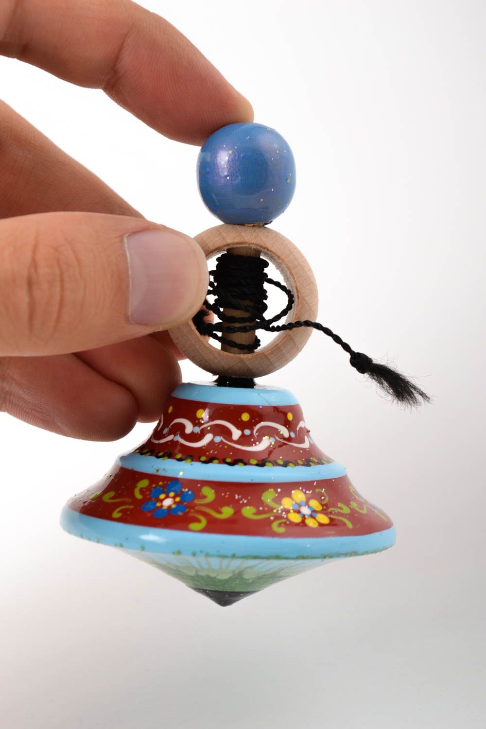 Trompo de madera hecho a mano regalo original juguete para niños con ornamentos foto 5