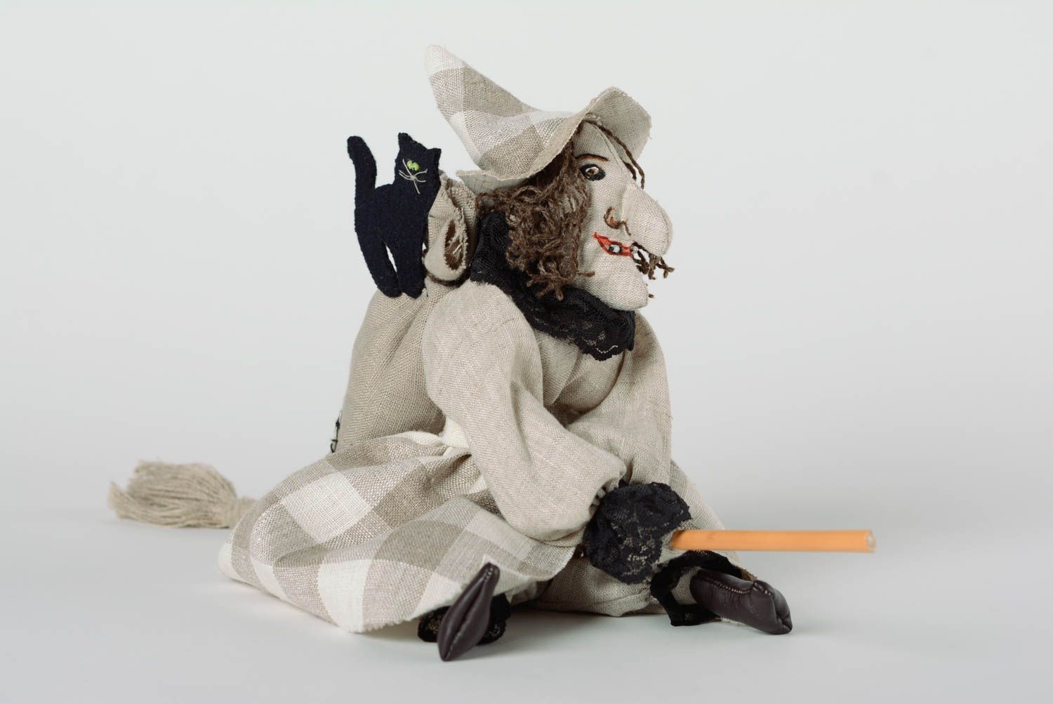 Handmade interior soft toy sewn of linen fabric Witch on a broom with eyelet photo 4