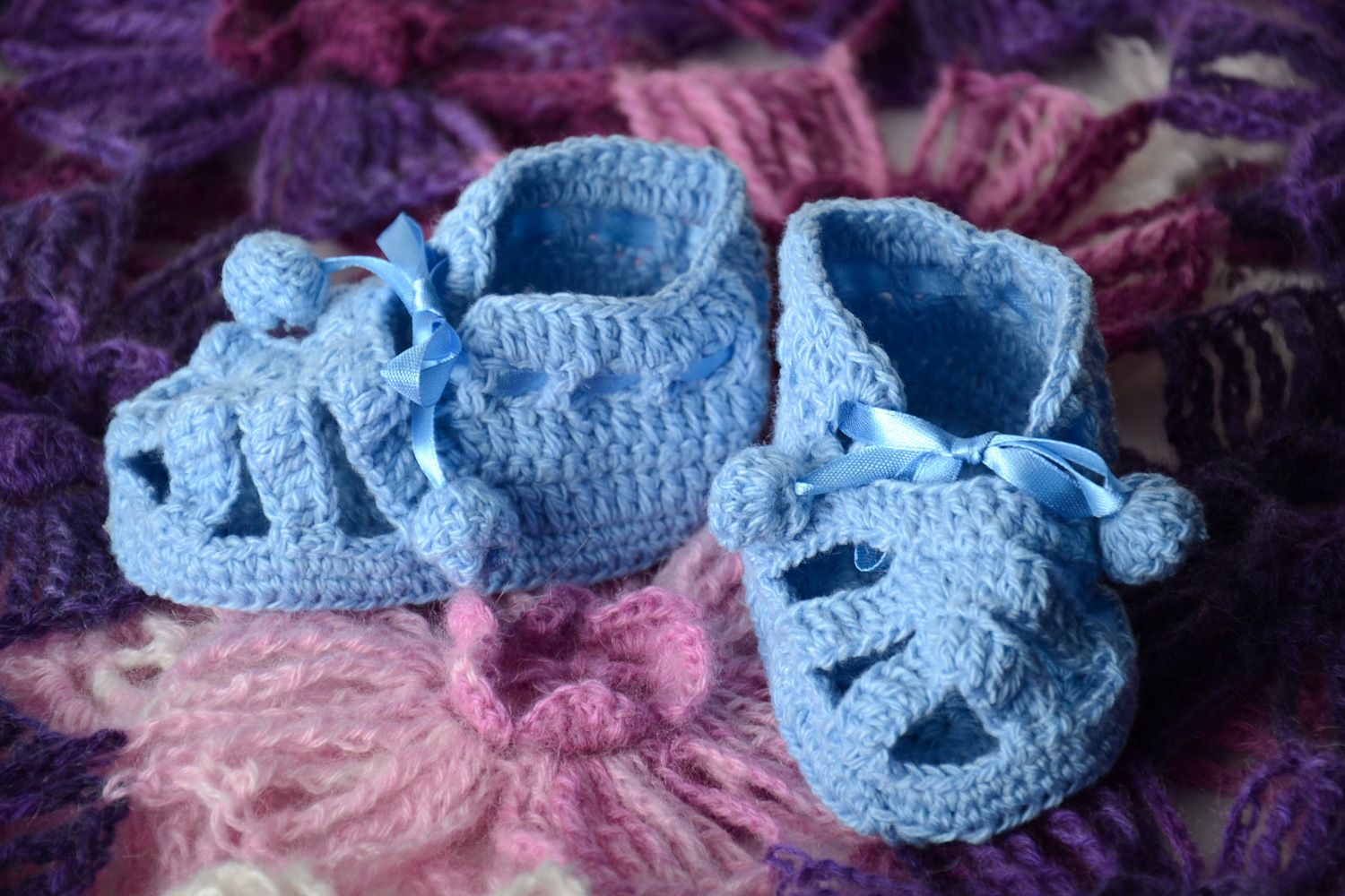 Handmade crochet acrylic and cotton baby booties of blue color photo 1