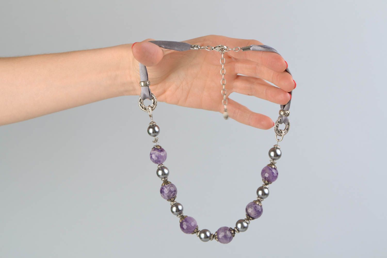 Beautiful necklace with natural stones of lilac color photo 2