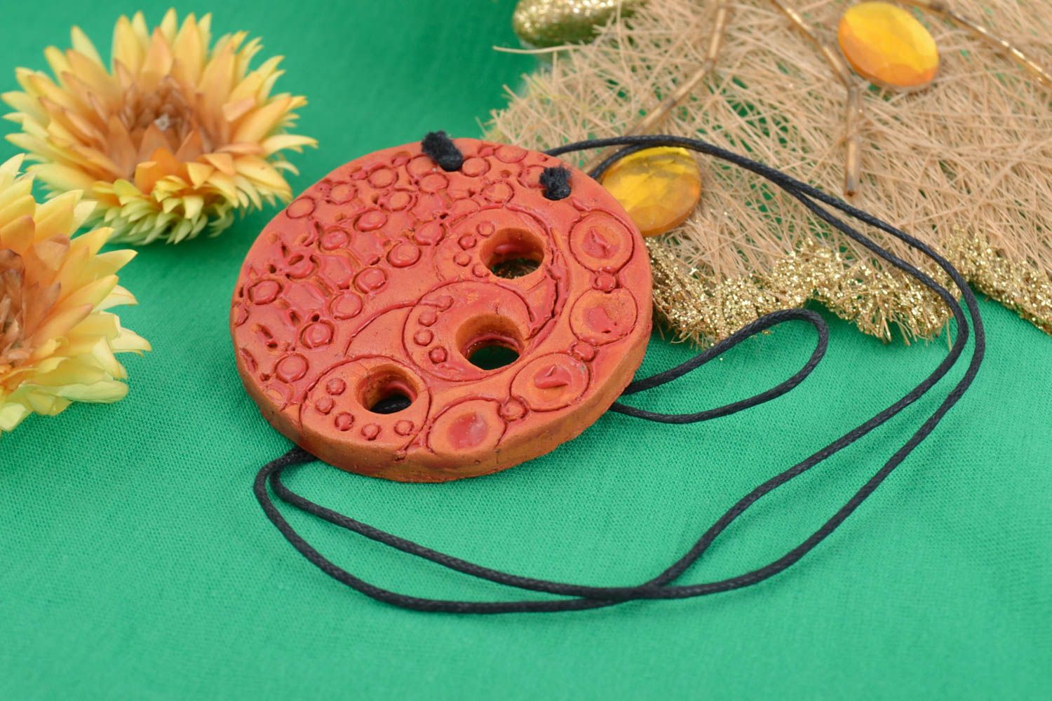 Handmade clay pendant round orange accessory with ornament on long cord photo 1