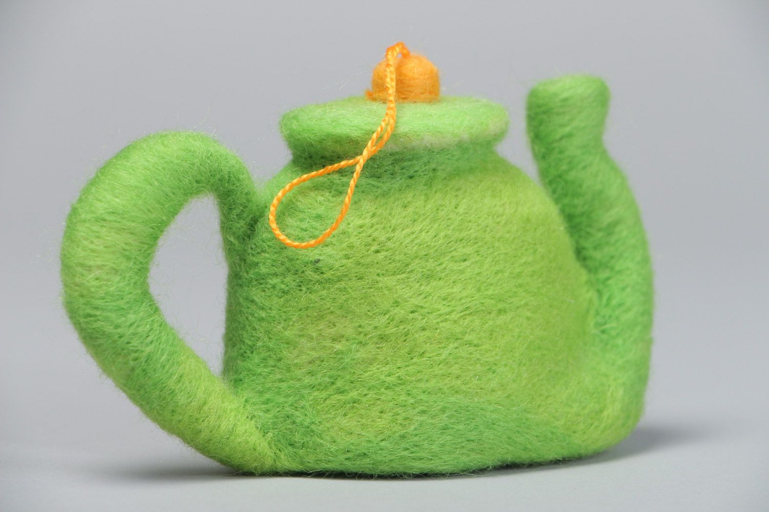 Handmade decorative toy made using the technique of dry felting green kettle with eyelet photo 3