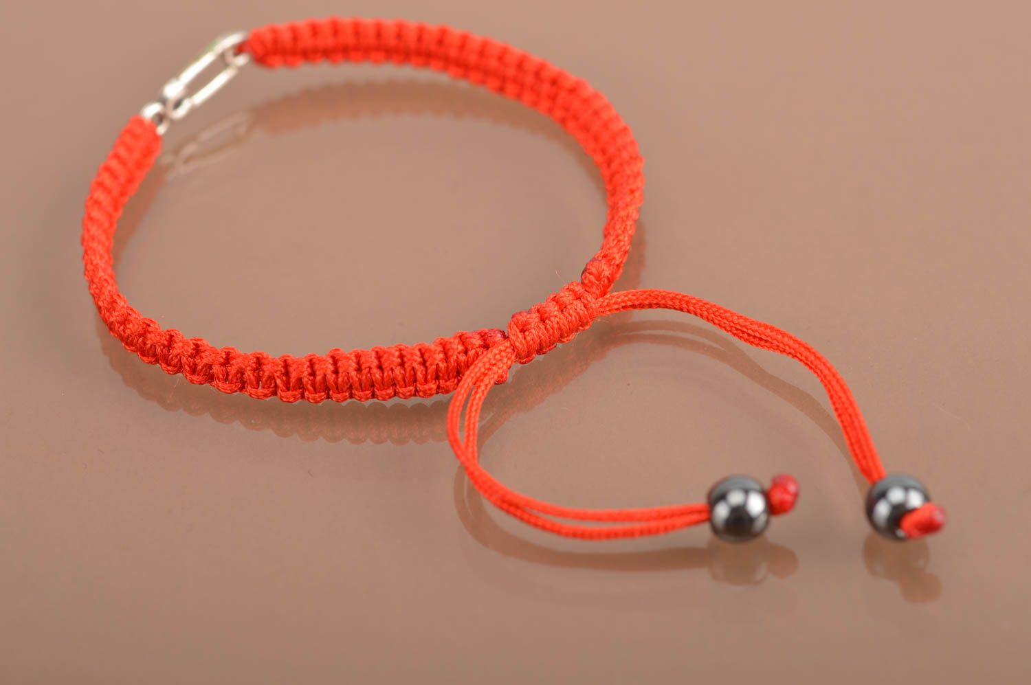 Handmade unusual stylish red bracelet made of silk threads with metal pin photo 5