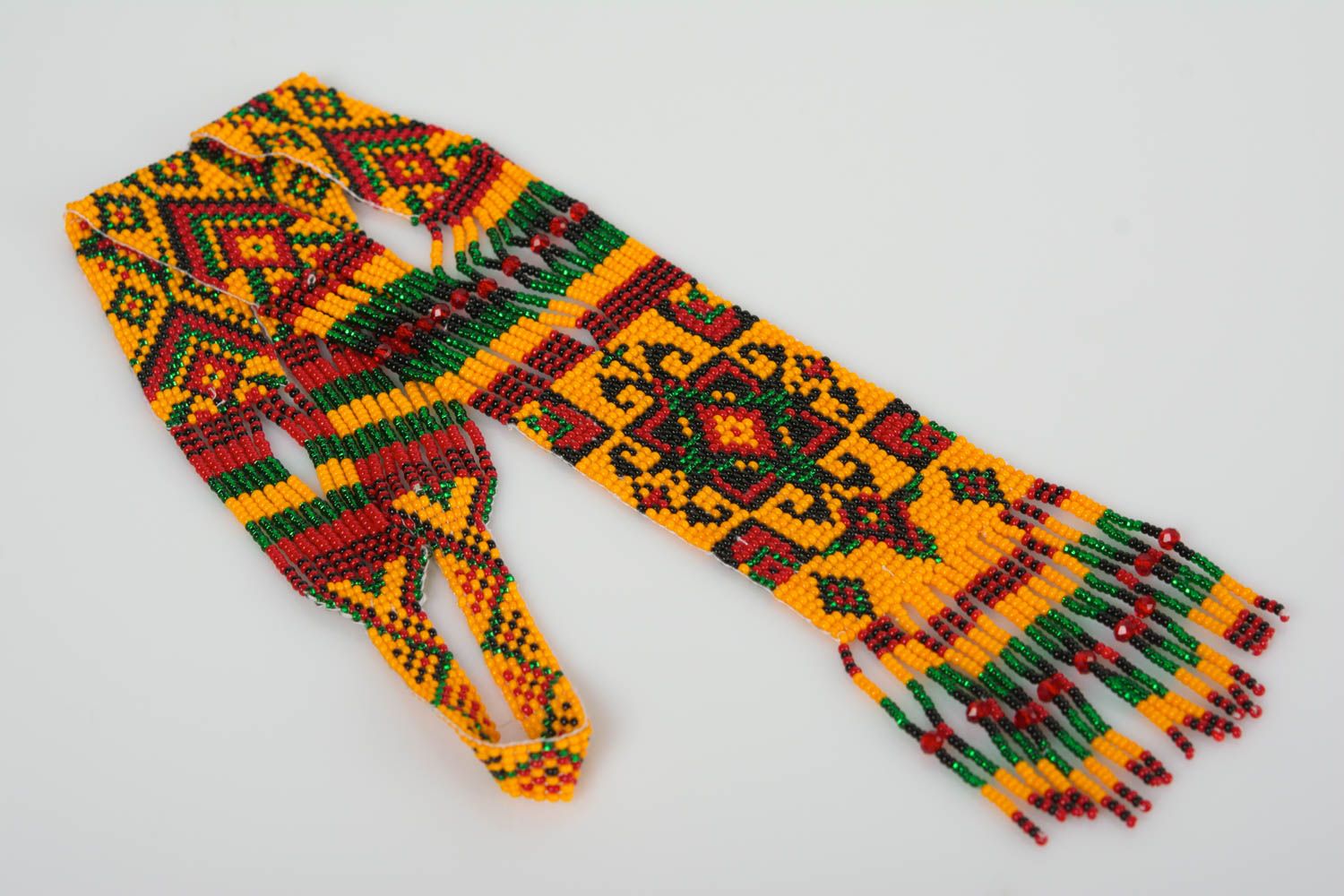 Collar hecho a mano de abalorios de estilo étnico artesanal largo anaranjado foto 1