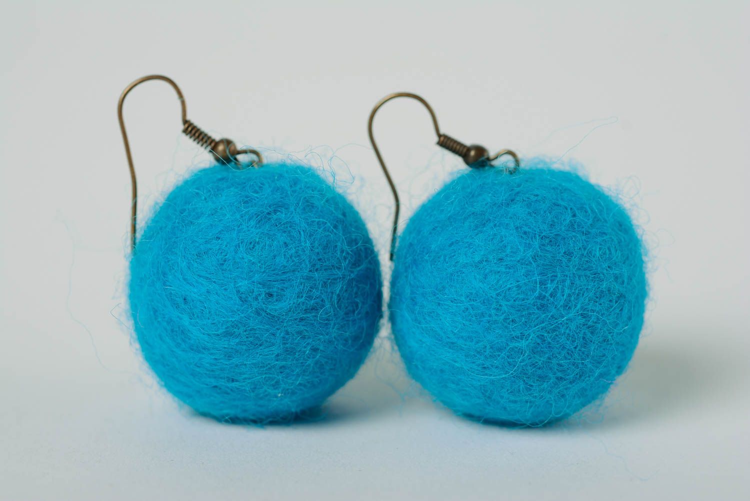 Handmade bright blue ball shaped dangling earrings felted of natural wool photo 1
