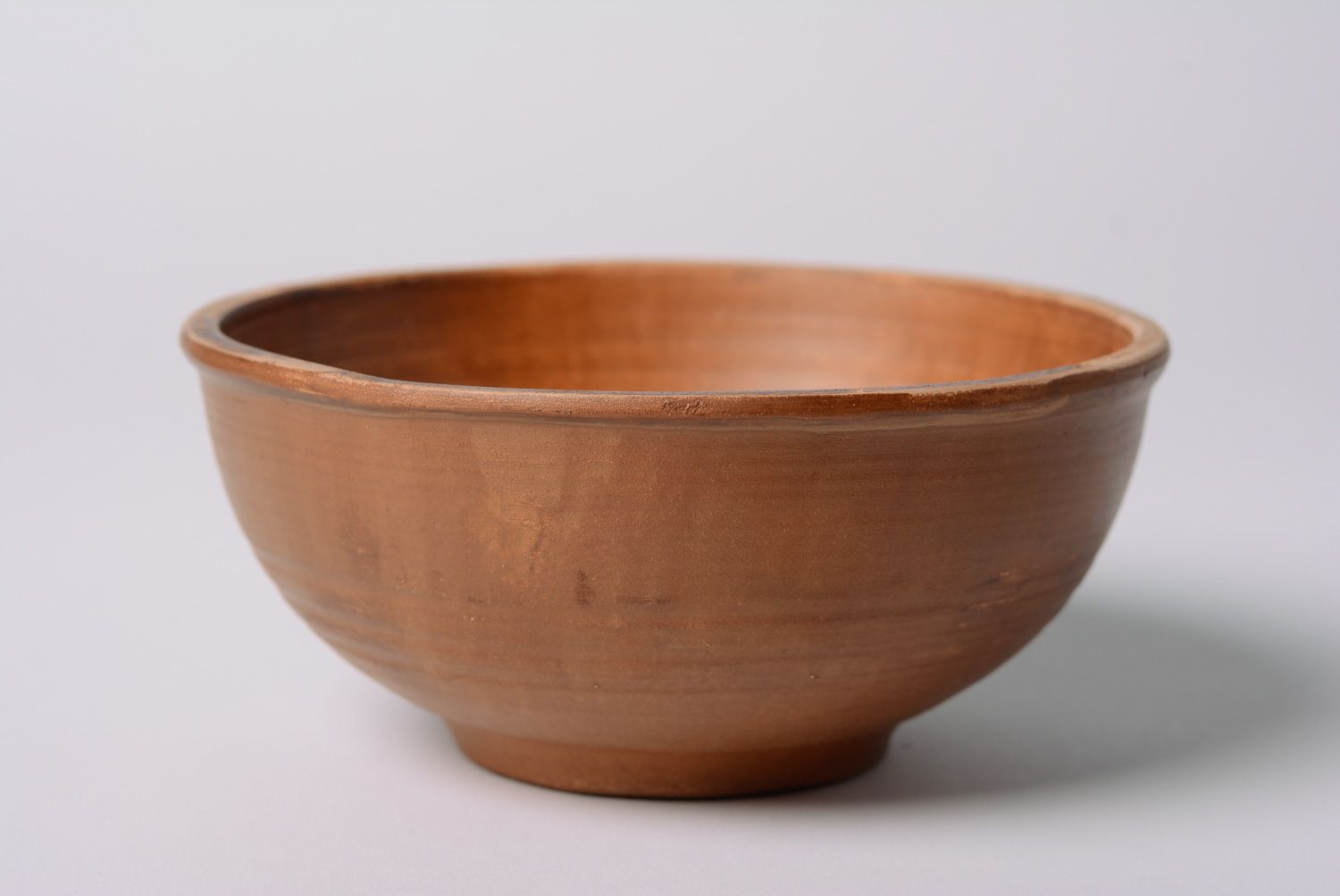 Handmade brown ceramic deep bowl kilned with milk in ethnic style for 500 ml photo 1