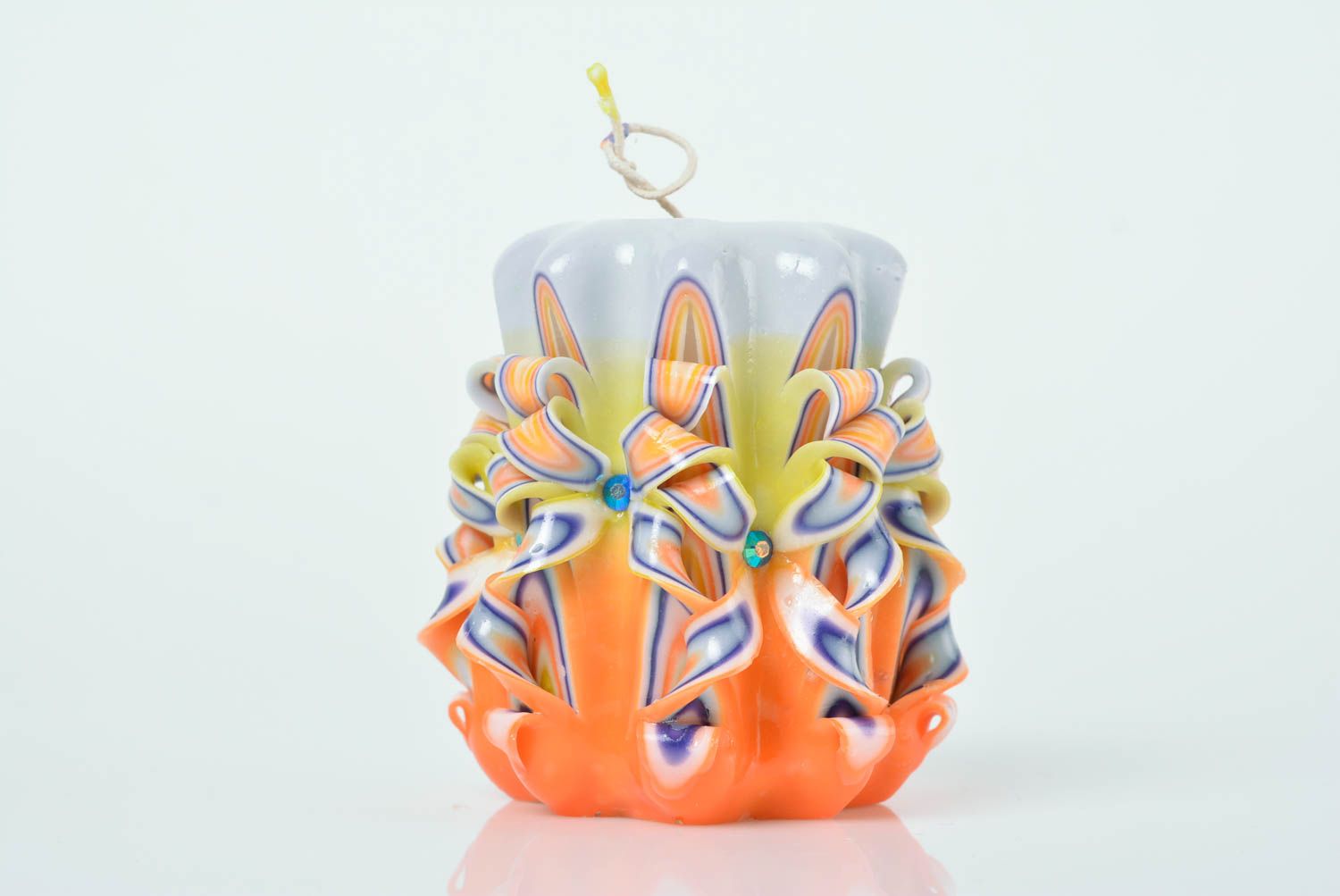 Beautiful colorful homemade designer carved paraffin candle photo 1