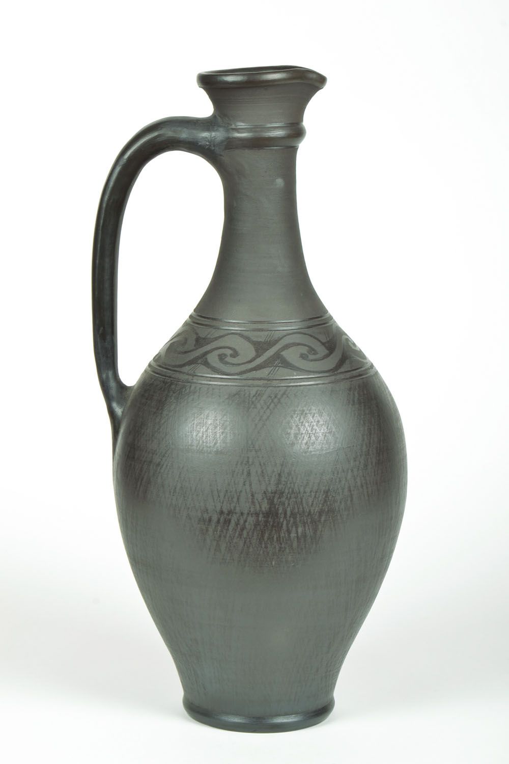 Schwarze Kanne aus Keramik foto 2