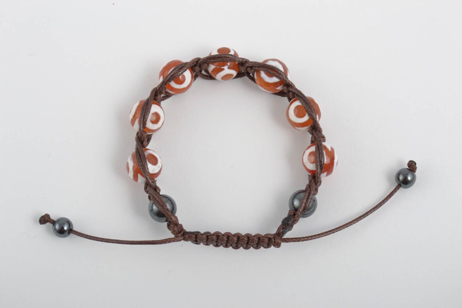Strand beaded gemstone hematite and agate bracelet on brown cord photo 2
