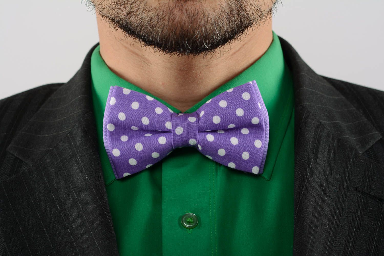 Purple bow tie with dots photo 1