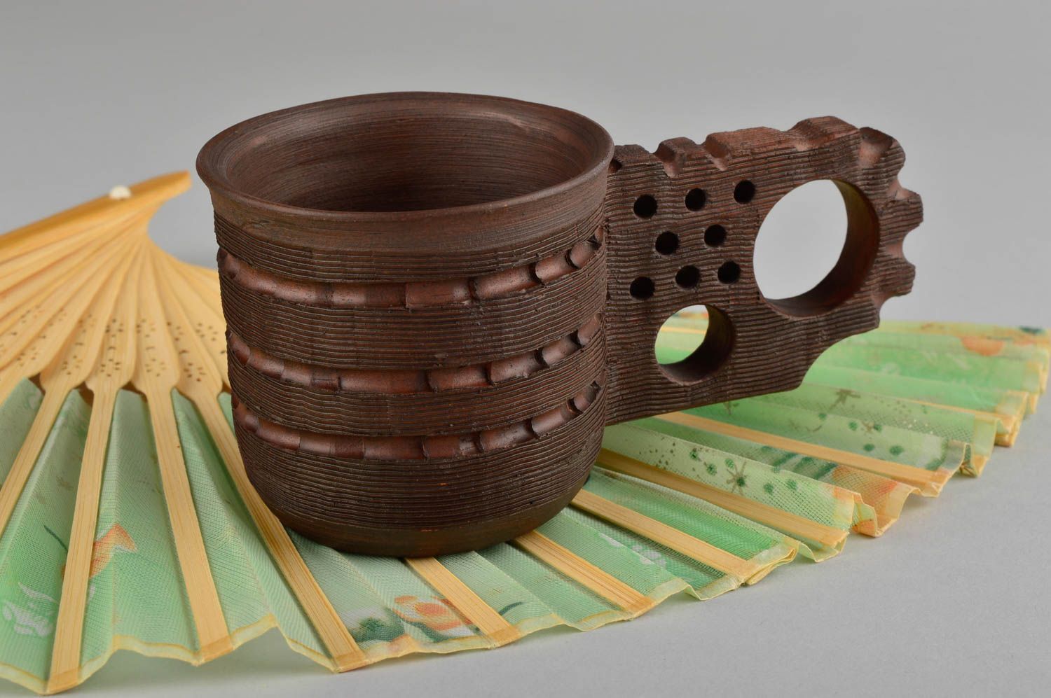 Handmade ceramic dark brown teacup with handle in the shape of cogwheel 0,26 lb photo 1