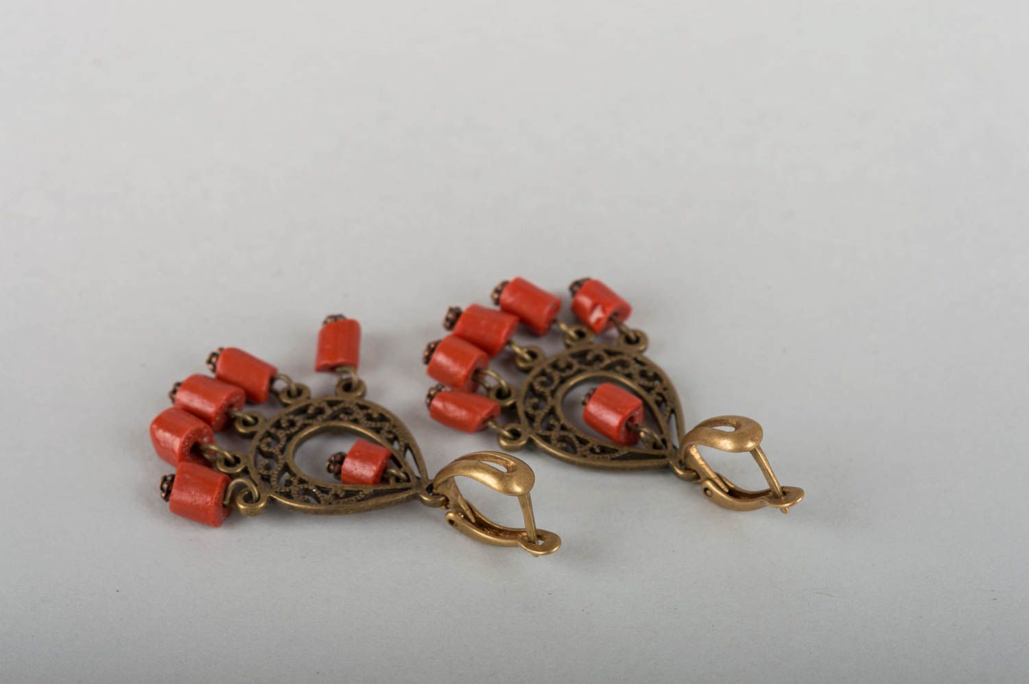 Handmade cute earrings made of natural stone coral with brass fittings photo 3