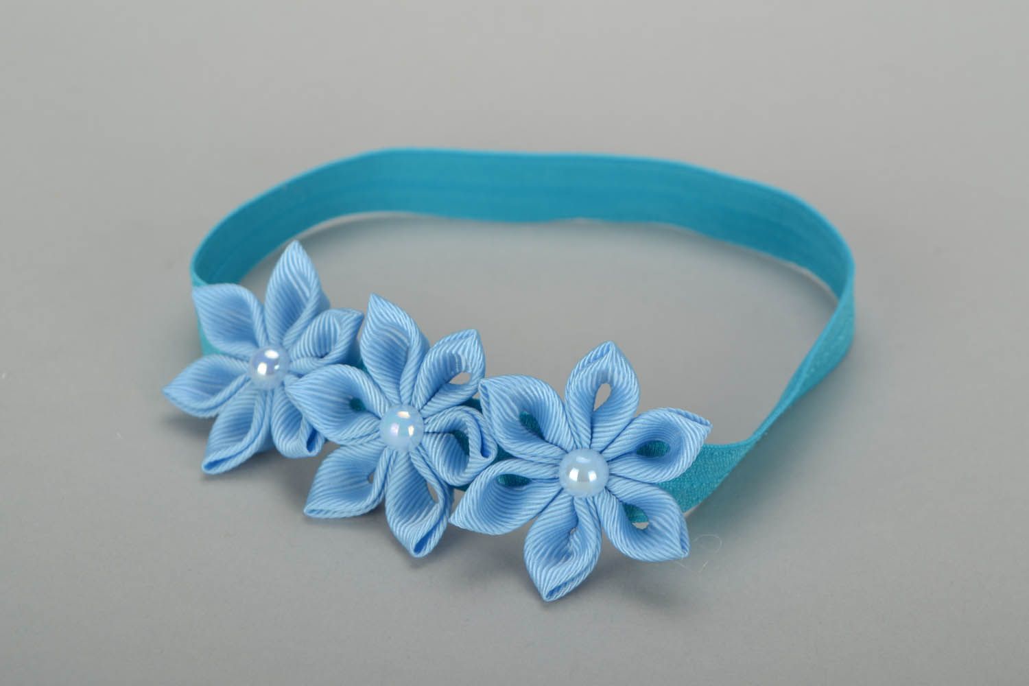 Bandeau pour cheveux avec fleurs bleu clair  photo 4