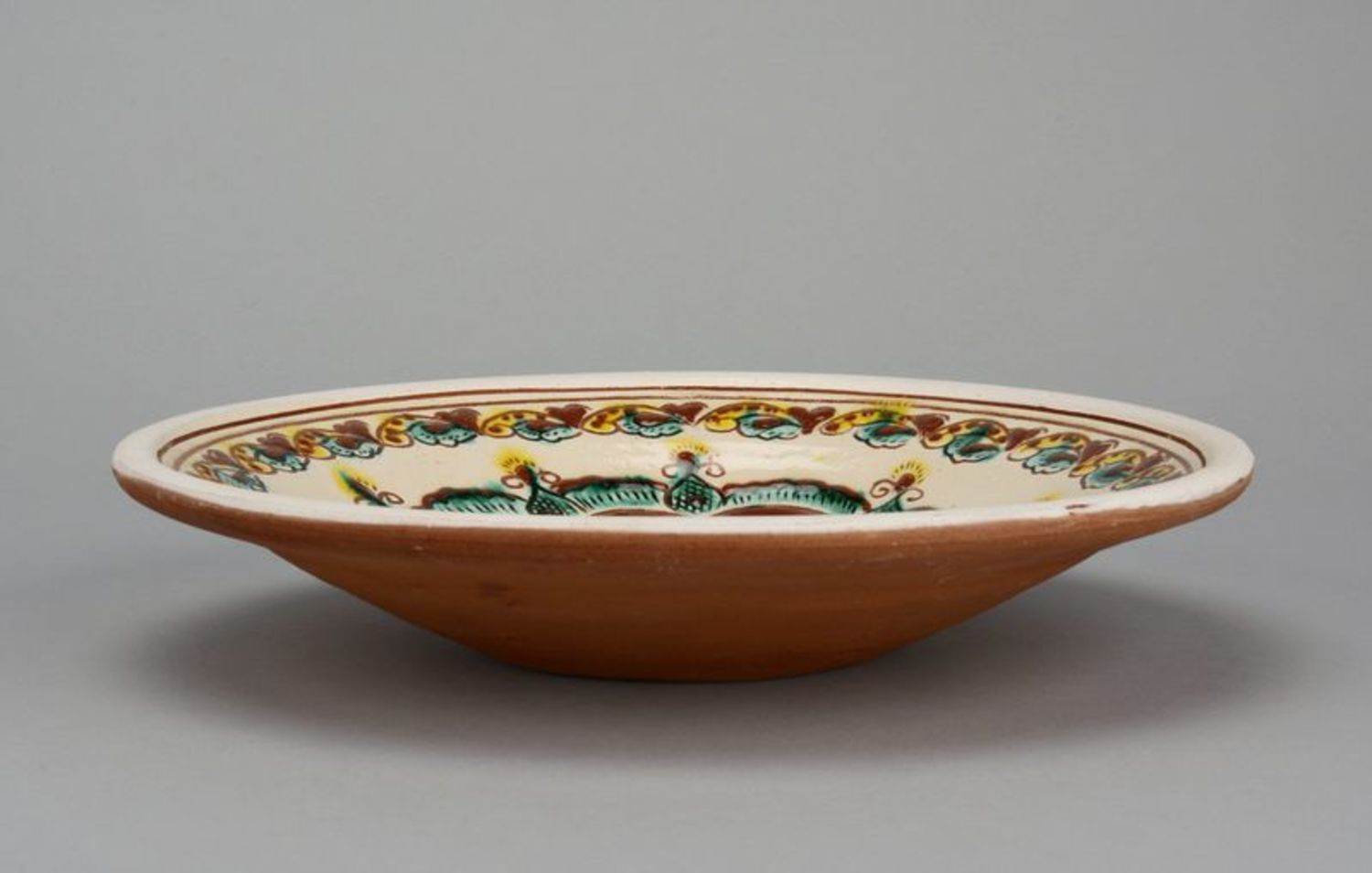 Декоративная настенная тарелка из глины фото 2