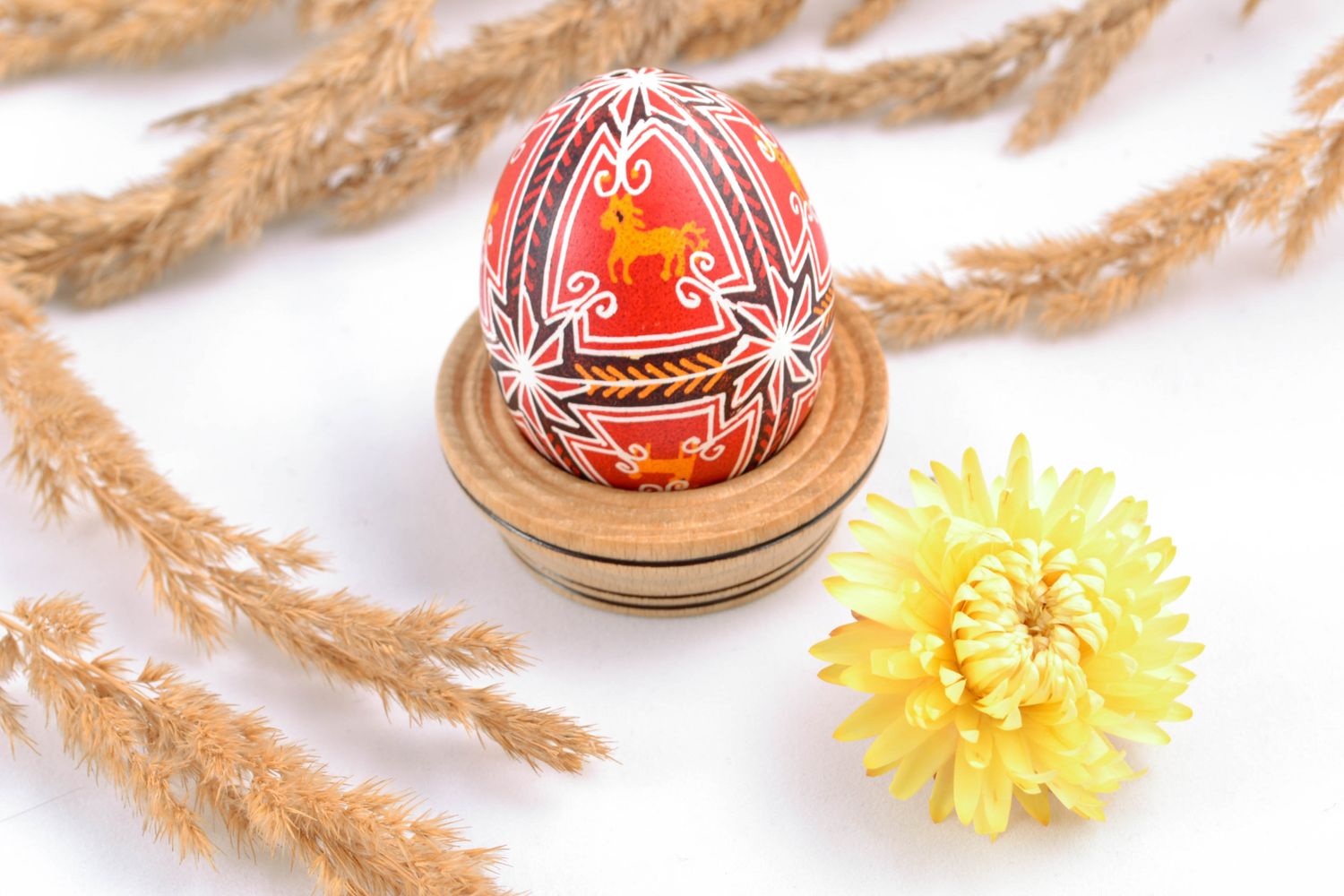 Handmade Easter egg painted in red color palette photo 1