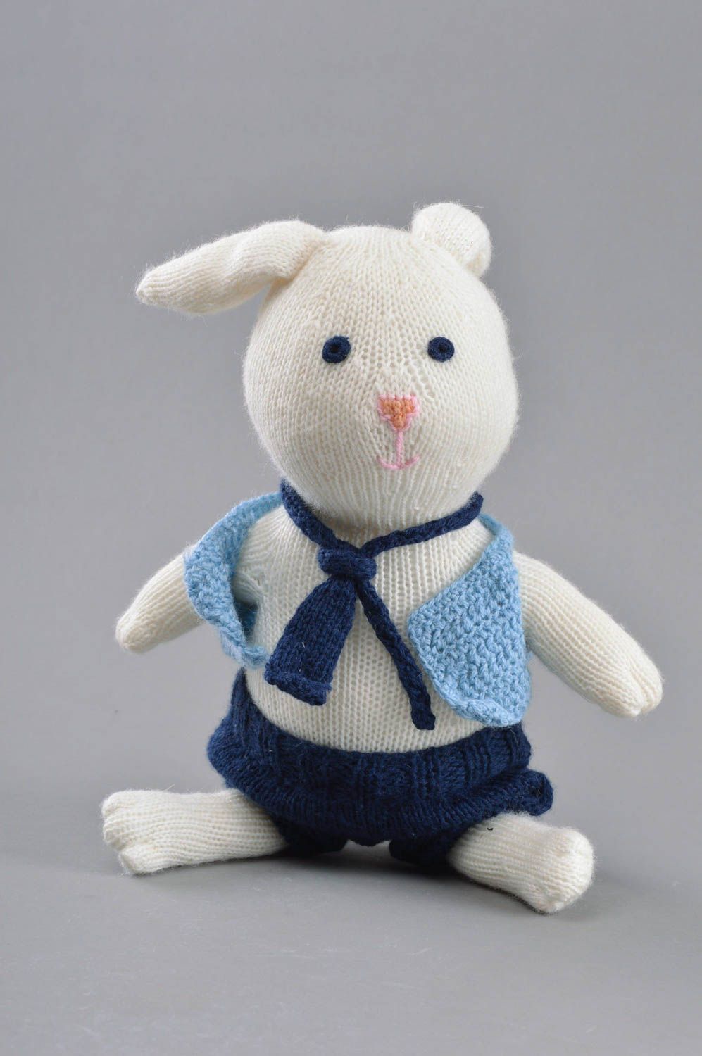 Handmade decorative crocheted toy white hare in shorts made of wool home decor photo 1