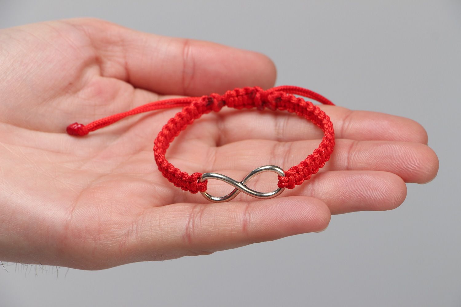 Handmade wrist friendship bracelet with synthetic cord of red color Eternity photo 3
