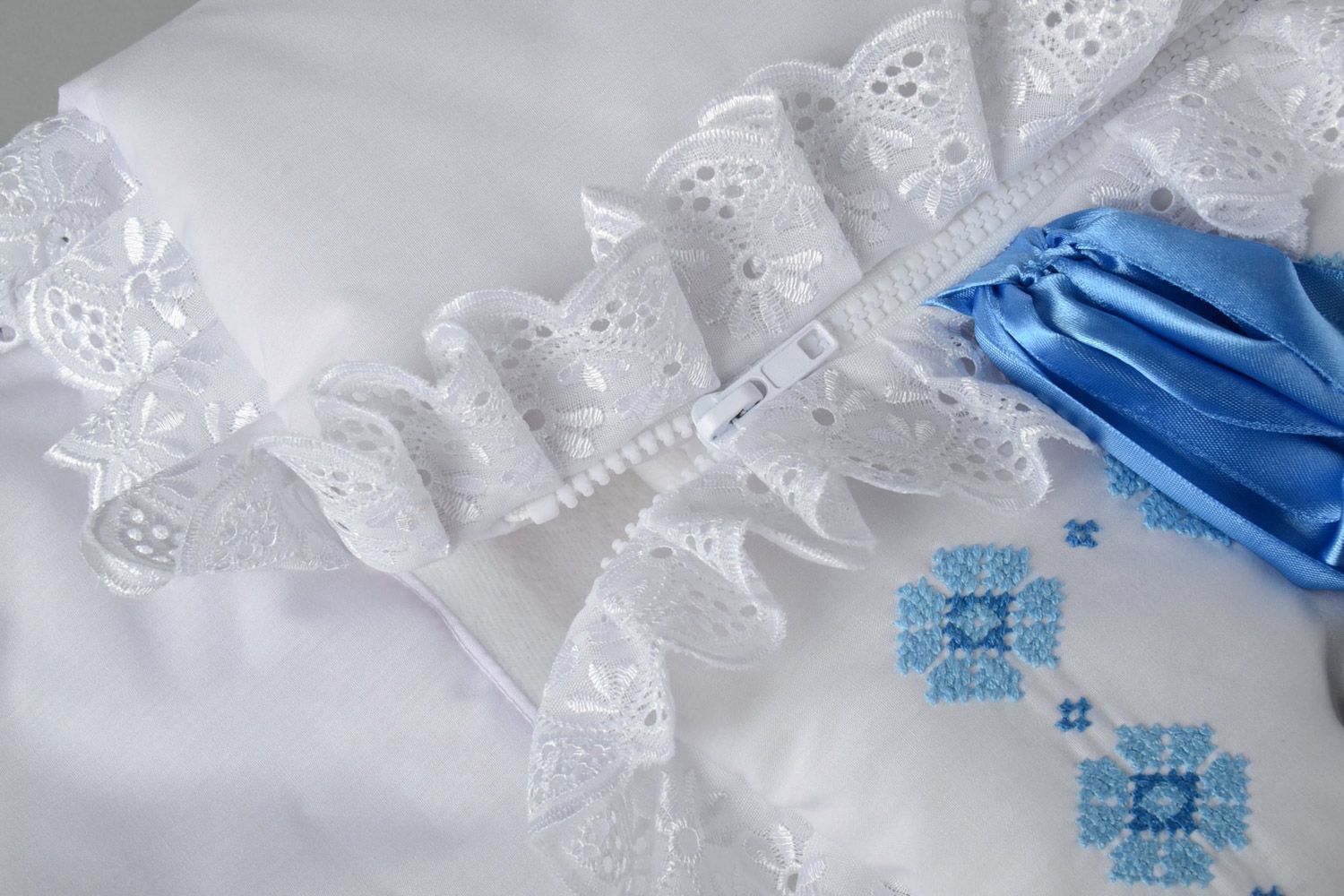 Handmade newborn blanket sewn of cotton with embroidery and blue ribbons photo 5