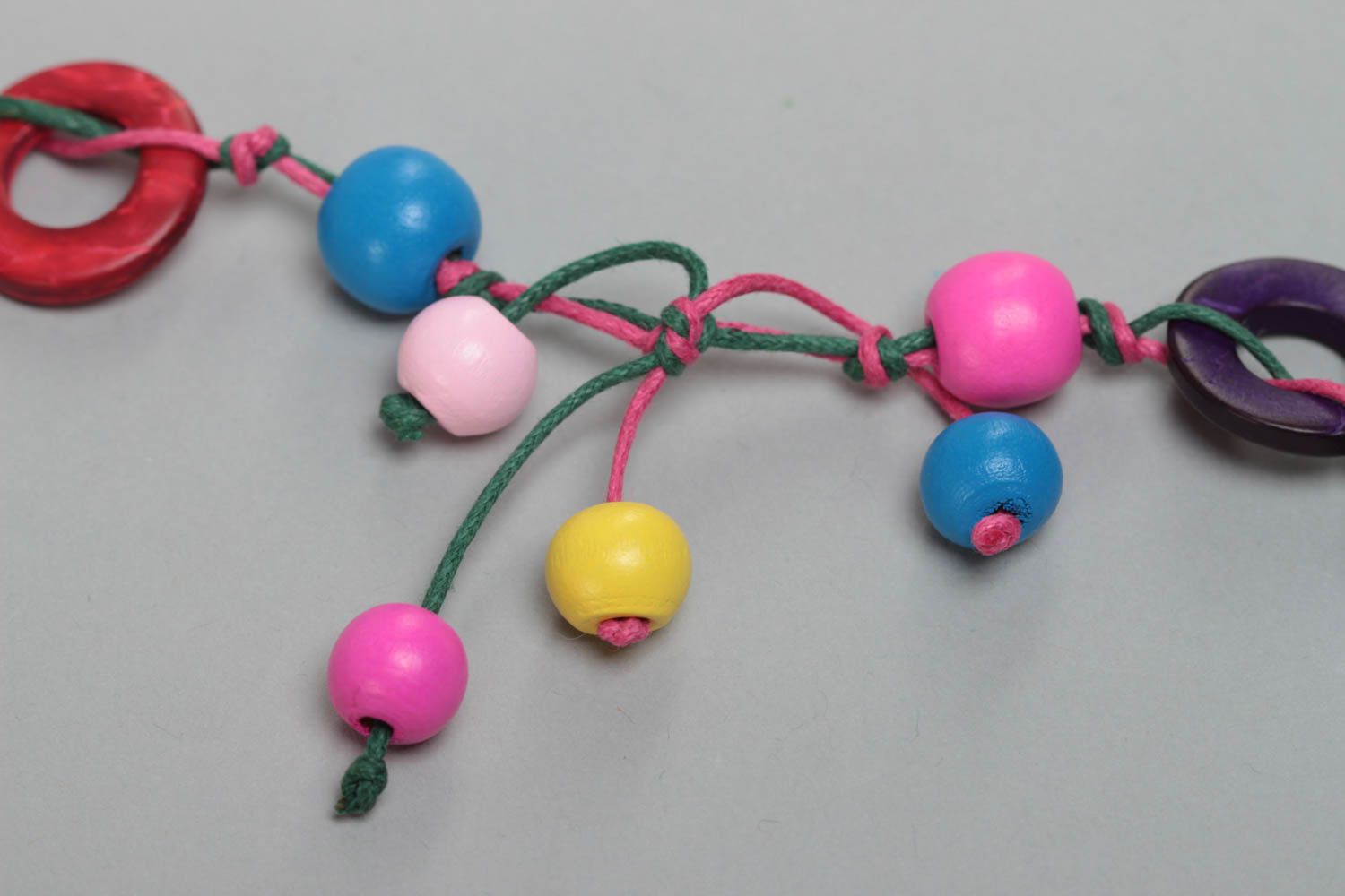 Beautiful bright necklace with wooden and coconut beads for children photo 4