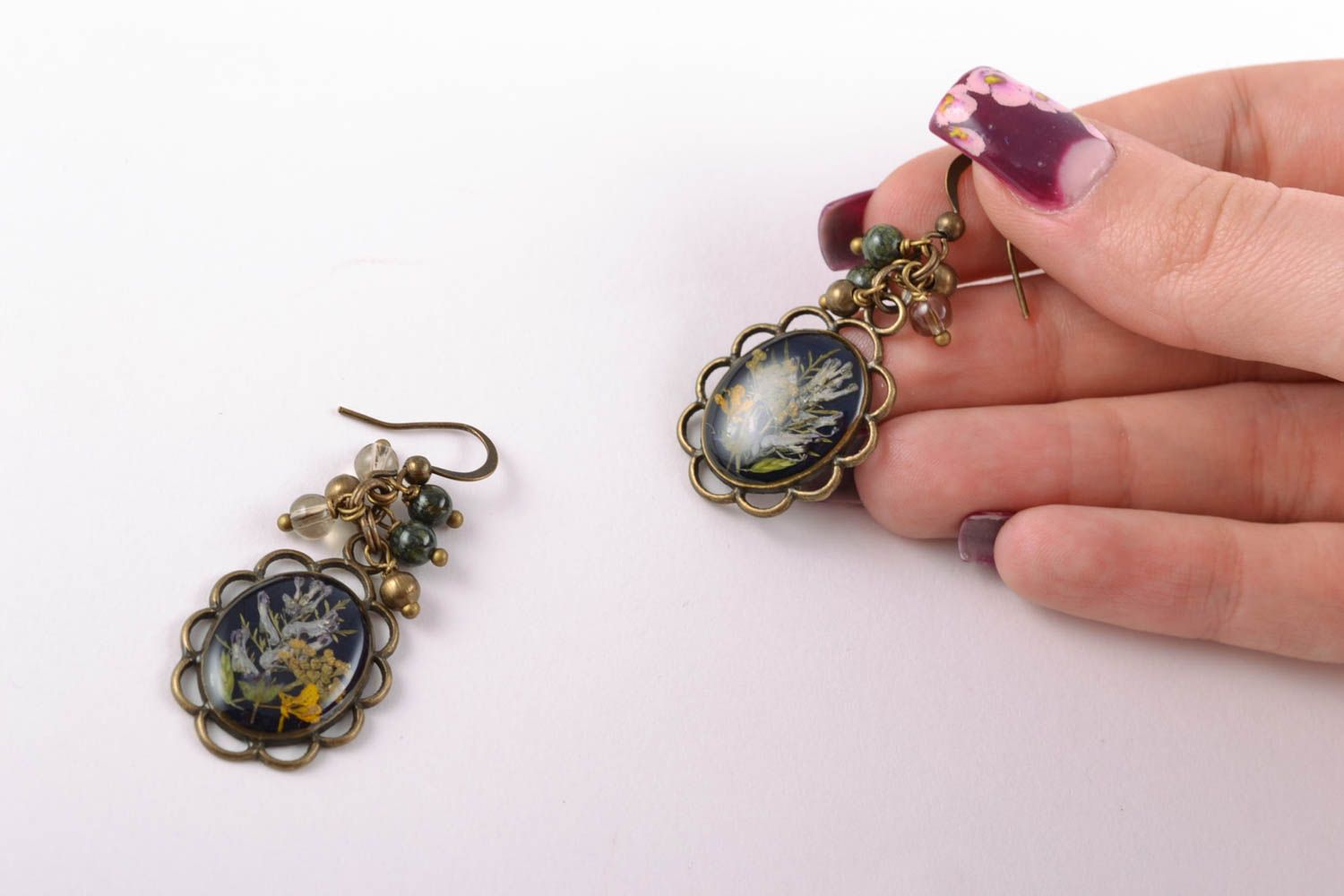 Long floral earrings with metal and epoxy resin photo 2