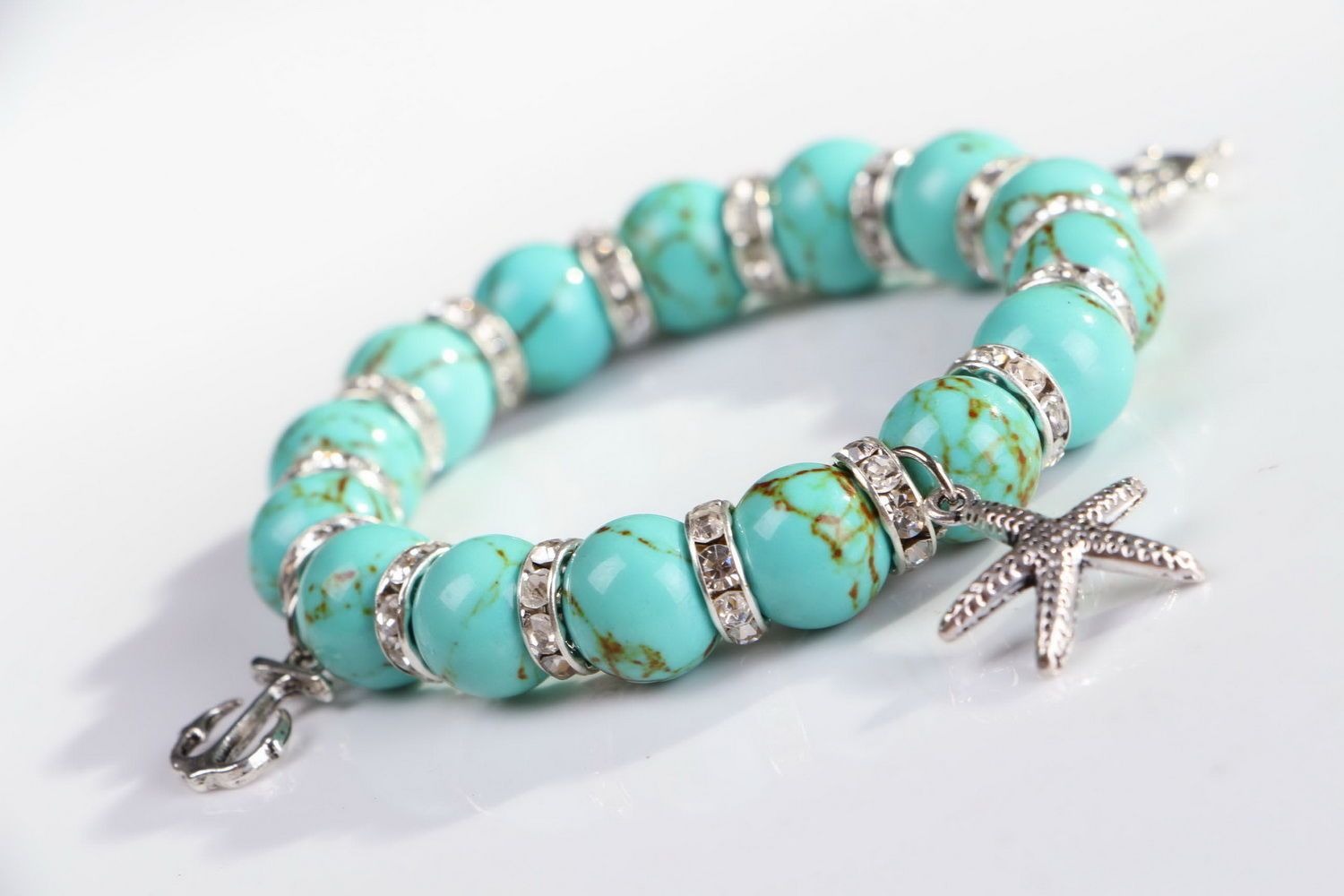 Bracelet with turquoise and pendants on elastic band photo 1