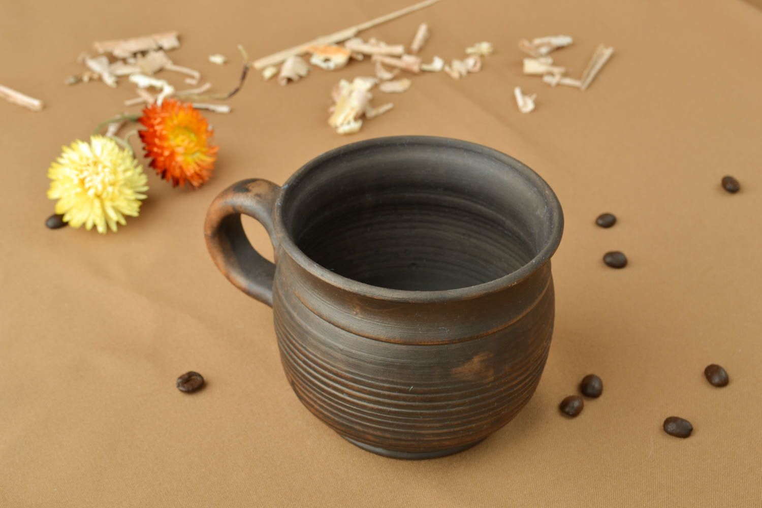 Ceramic drinking cup kilned with milk in rustic design with handle and no pattern photo 5