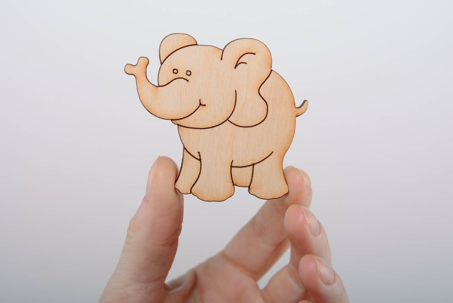 Roh Figur aus Holz Lächelder Elefant foto 4