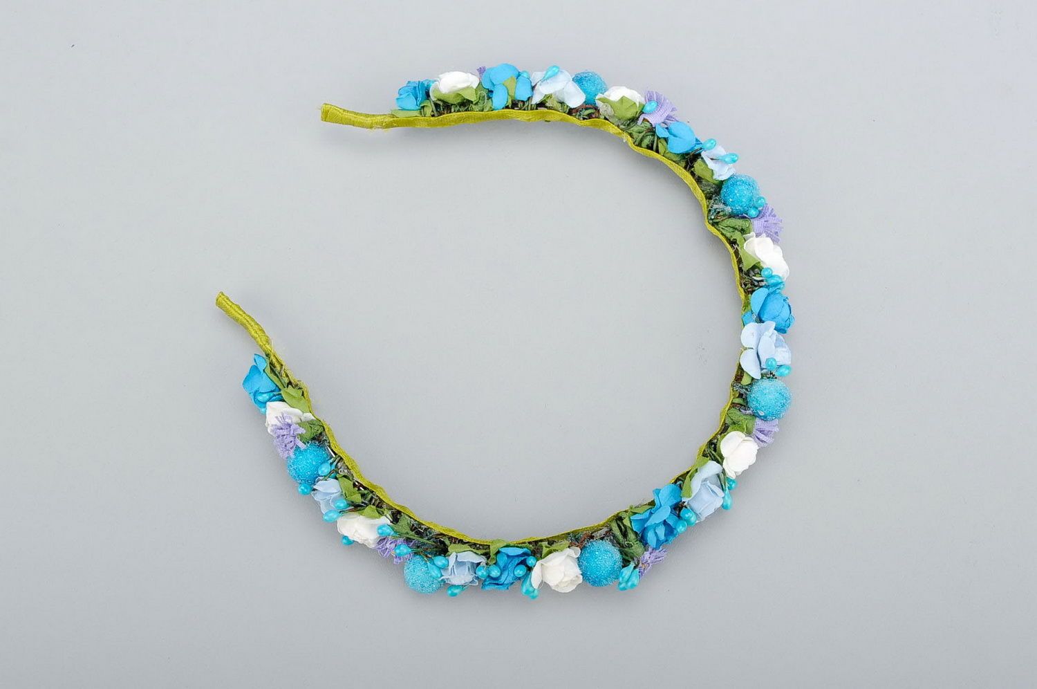 Headband with blue artificial flowers photo 3