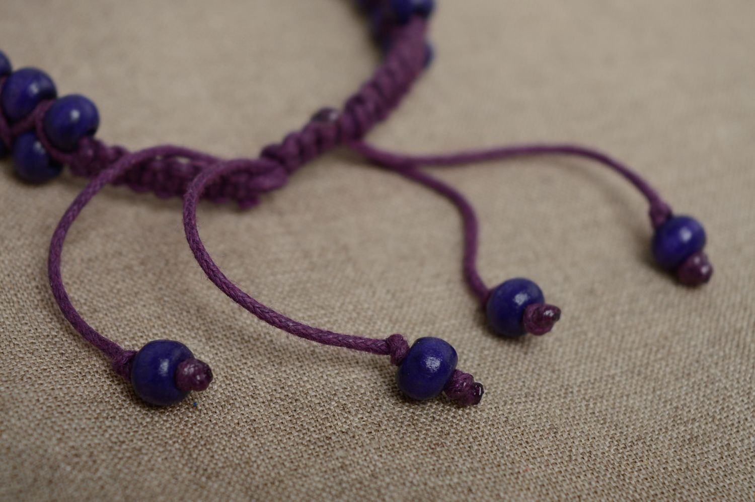 Violet macrame bracelet made of waxed cord and wooden beads photo 4