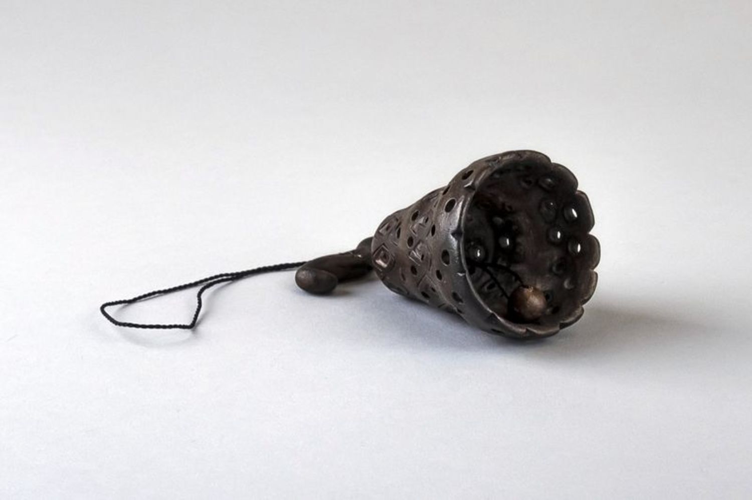 Ceramic bell on a rope photo 5