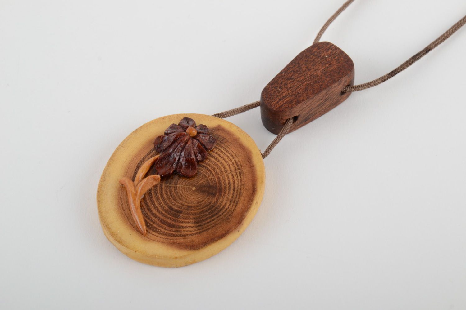 Handmade designer carved wooden neck pendant coated with varnish for women photo 3