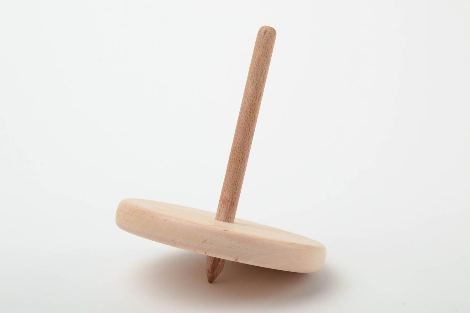 Peonza de madera hecha a mano y pulida juguete de desarrollo para niños  foto 2