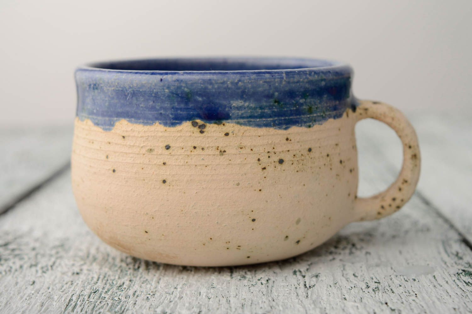 Ceramic glazed inside wide 5 oz coffee cup in beige color outside and dark blue inside photo 1