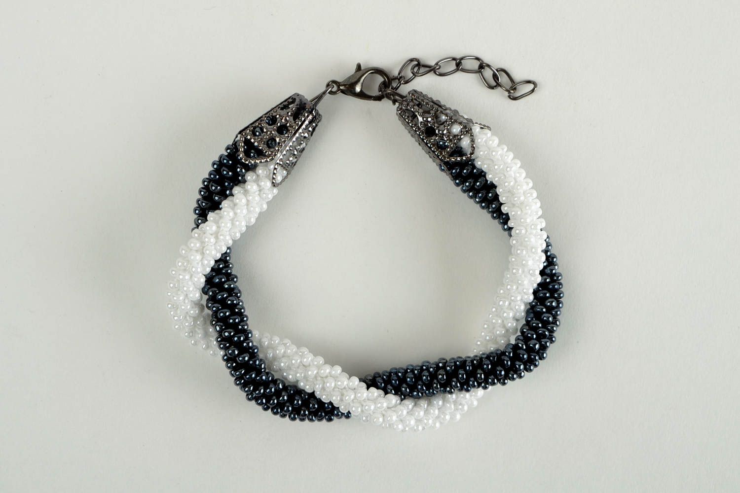 Two cord beaded bracelets in white and black colors for women photo 4