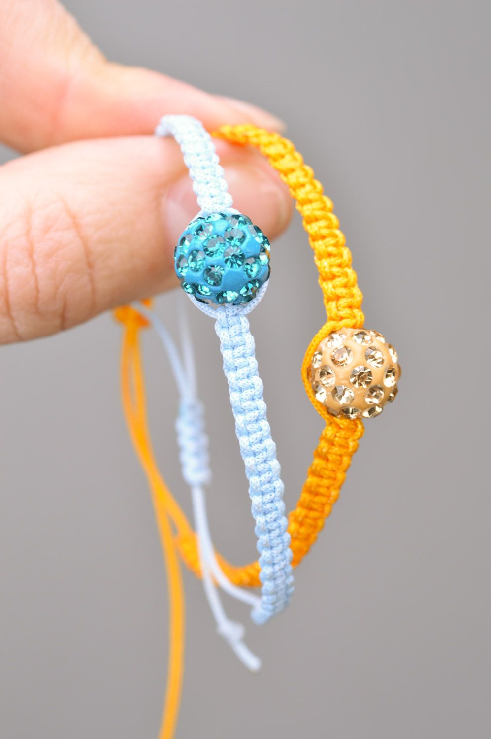 Set of 2 handmade friendship wrist bracelets of yellow and blue colors with beads photo 3