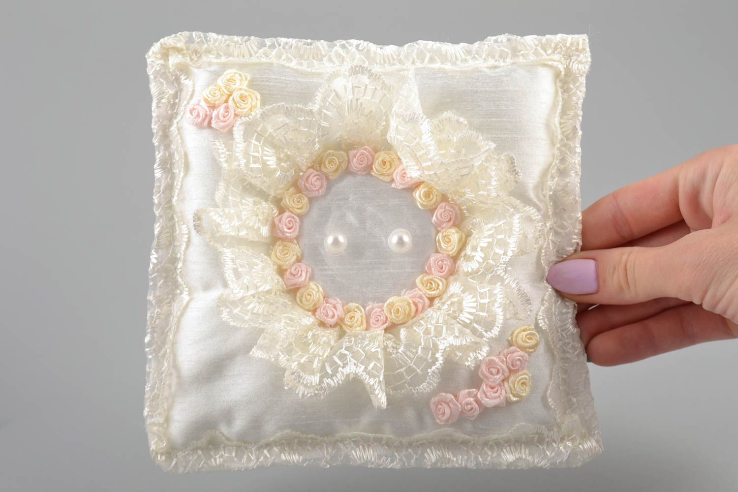 Handmade gentle white wedding bearer pillow decorated with flowers photo 5