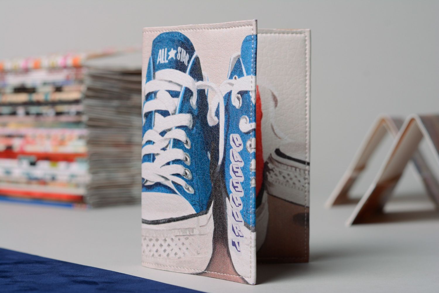 Handmade leather passport cover with gym shoes print photo 1