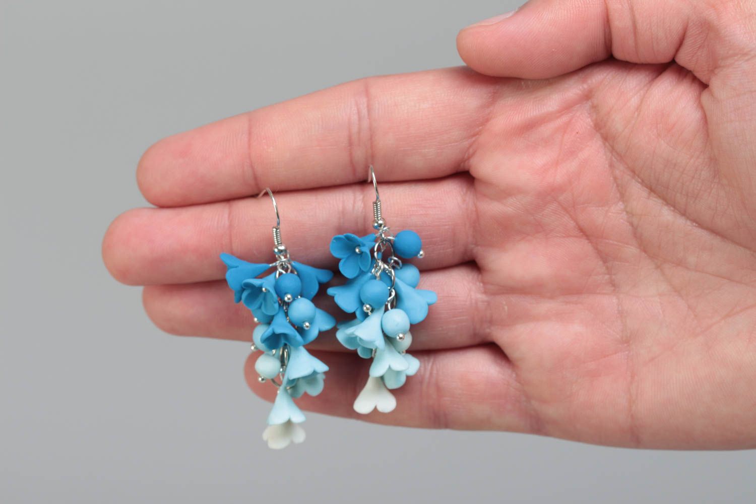 Handmade designer polymer clay flower dangle earrings in blue color palette photo 5