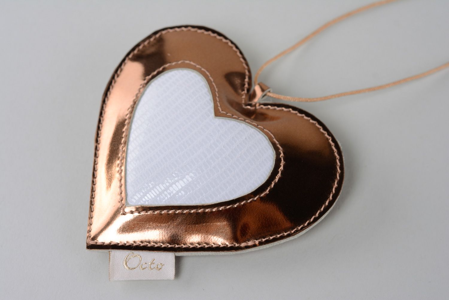 Soft leather keychain in the shape of heart photo 4