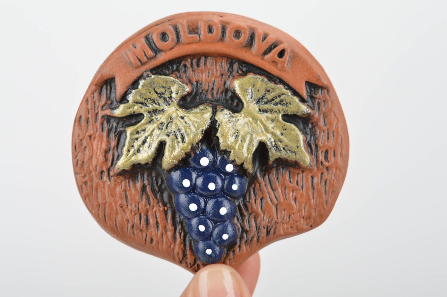 Handmade ceramic souvenir magnet for refrigerator decorated with grapes photo 3
