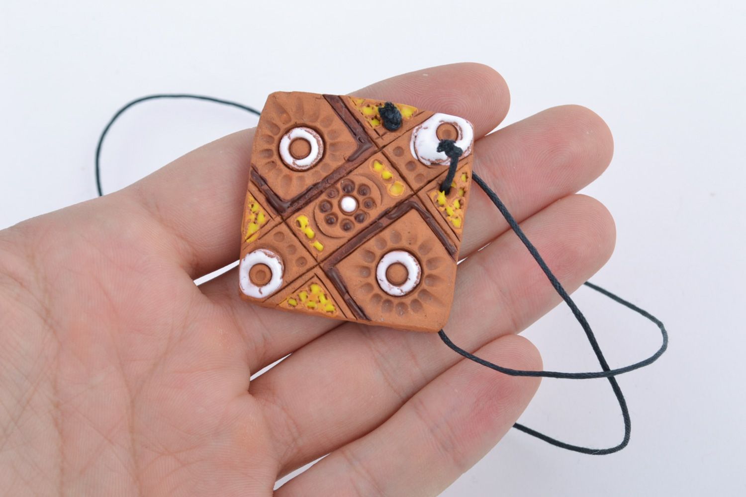 Handmade ceramic pendant with painting in ethnic style and cord for women photo 2