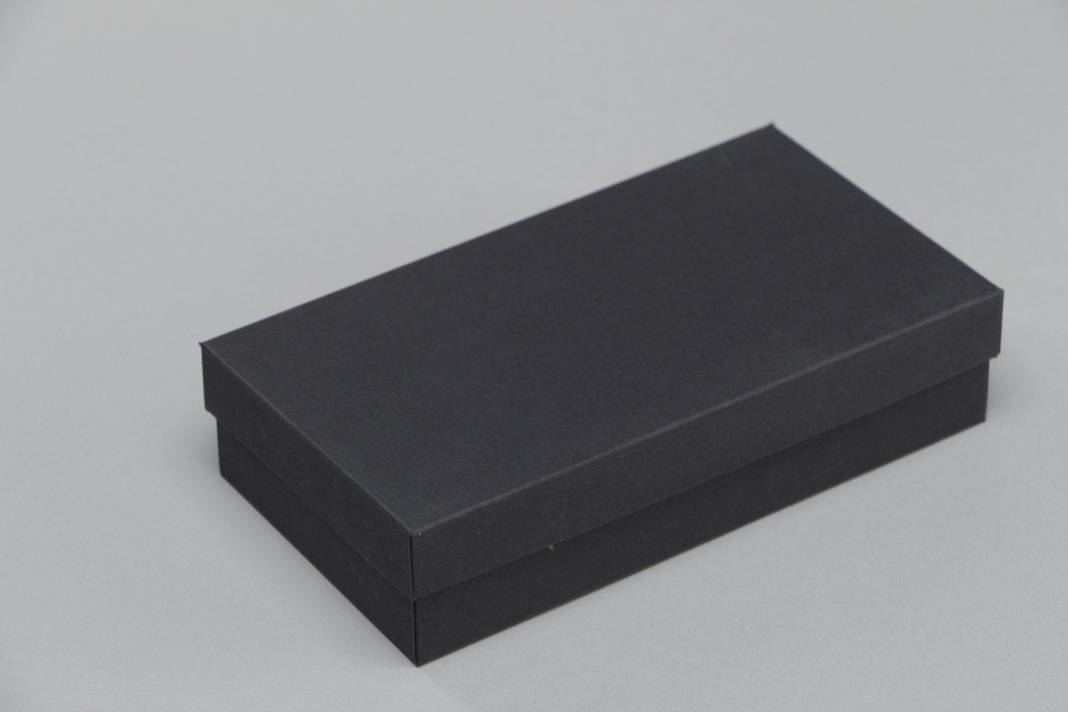 Handmade minimalistic carton gift box of rectangular shape of black color photo 3