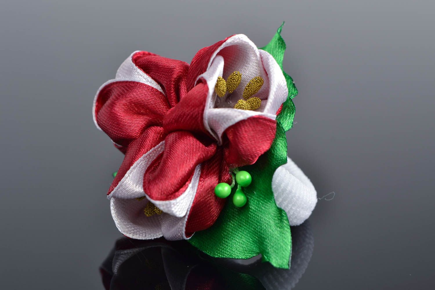 Children's handmade satin ribbon flower hair tie of red color photo 1