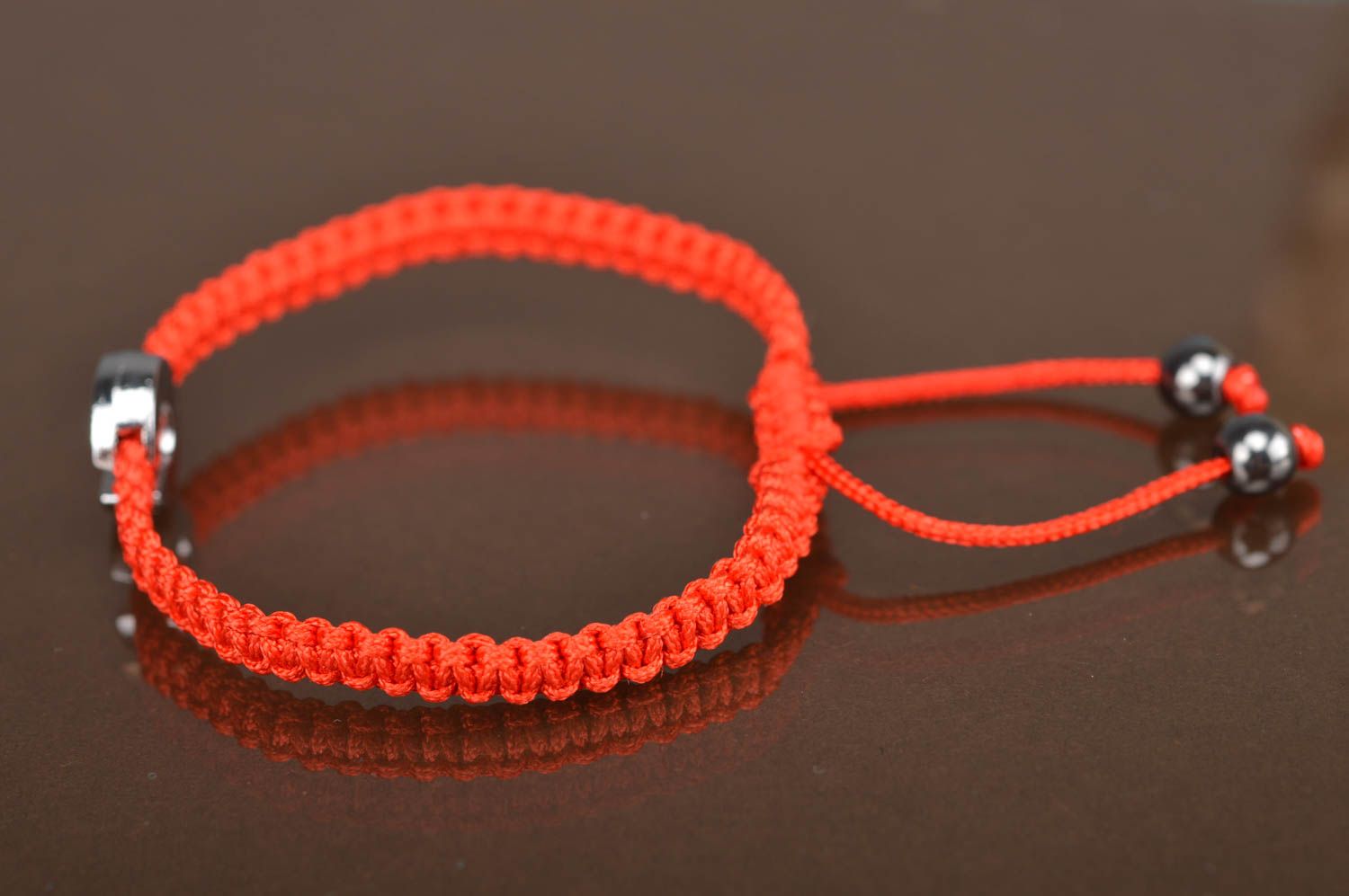 Handmade woven friendship bracelet made of red cords with letter C photo 4