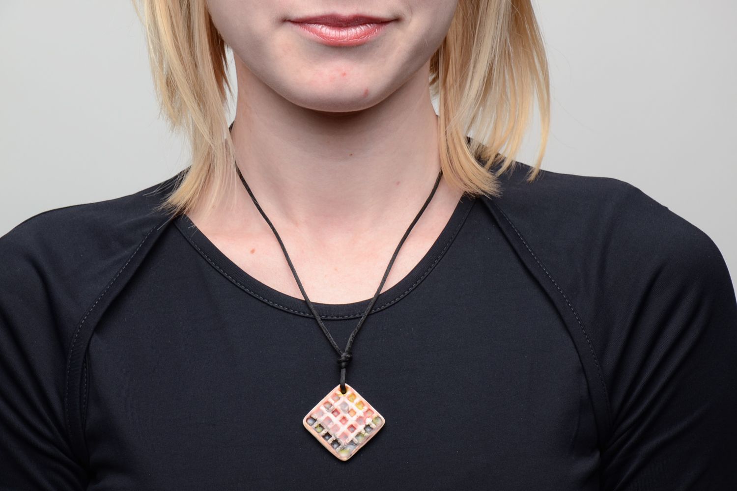 Ceramic pendant of rhombus shape with waxed cord photo 2