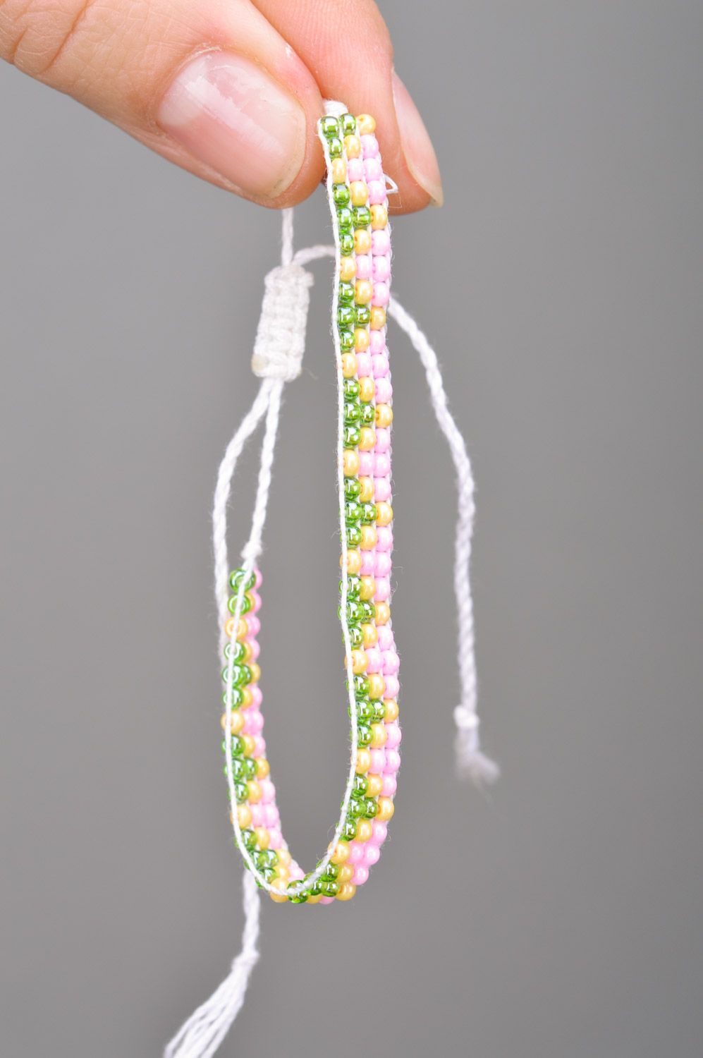 Beautiful designer handmade three-lane woven bead bracelet for women photo 3
