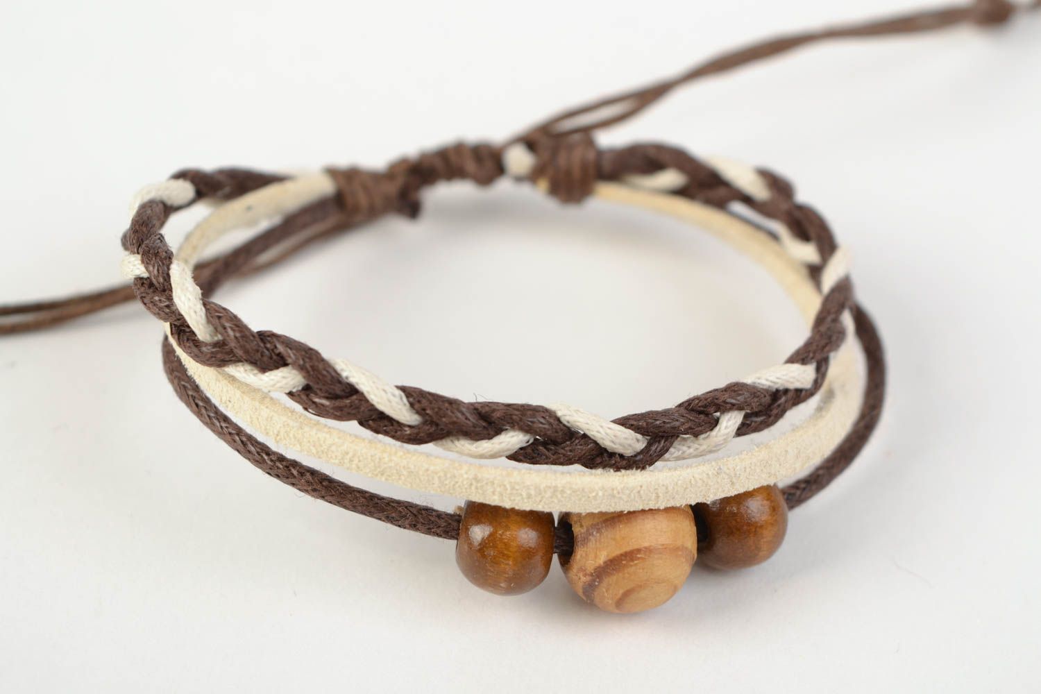 Handmade thin brown suede cord woven wrist bracelet with wooden beads insert photo 3