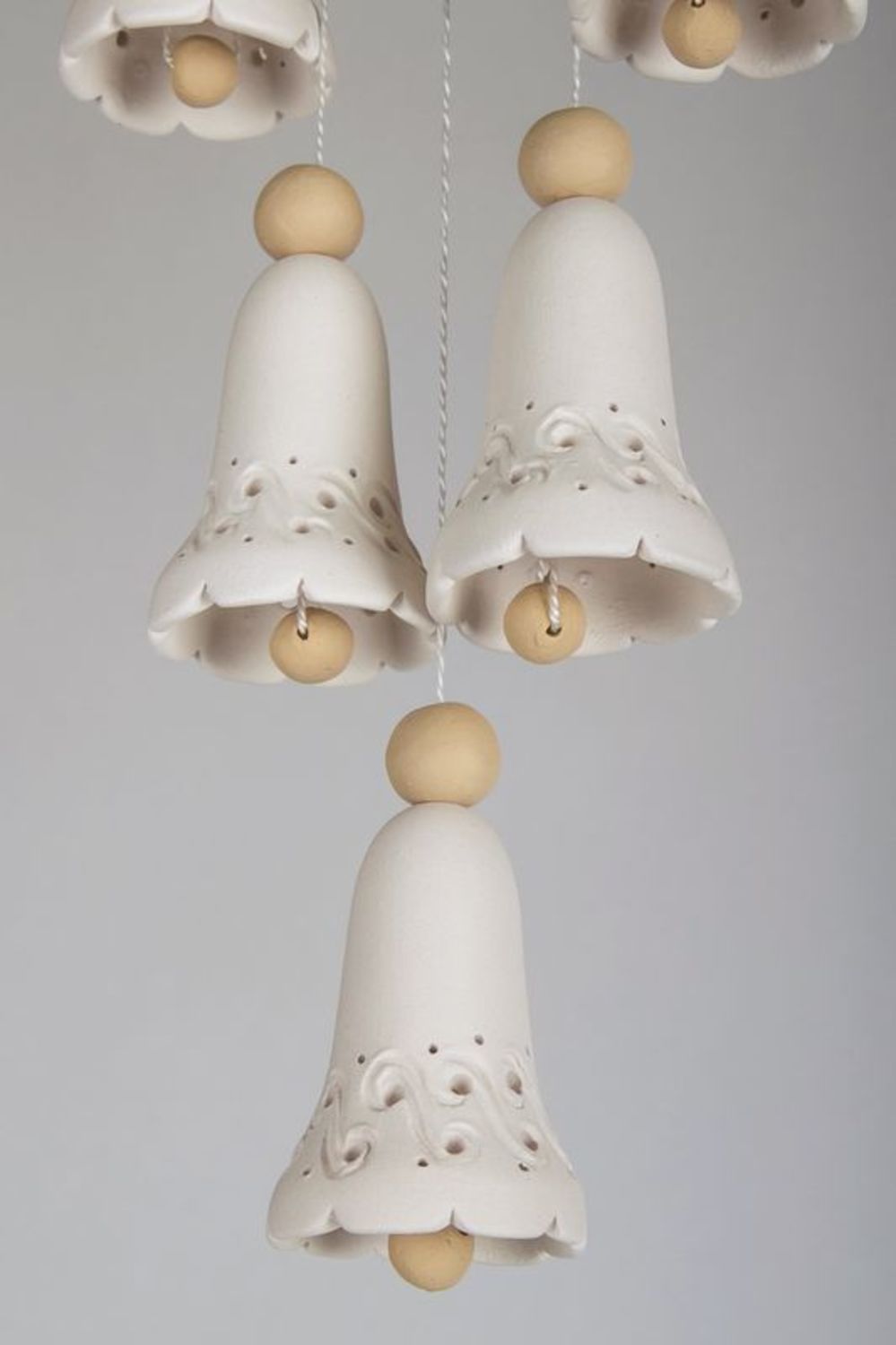 White and brown ceramic bells  photo 3