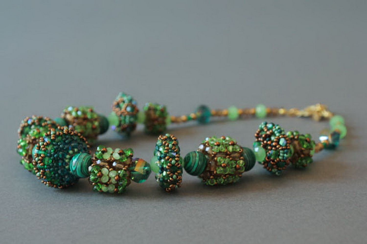 Handmade beaded necklace with decorative stones photo 1